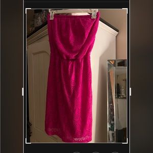 Lilly Pulitzer pink lacey dress above the knee. Strapless.